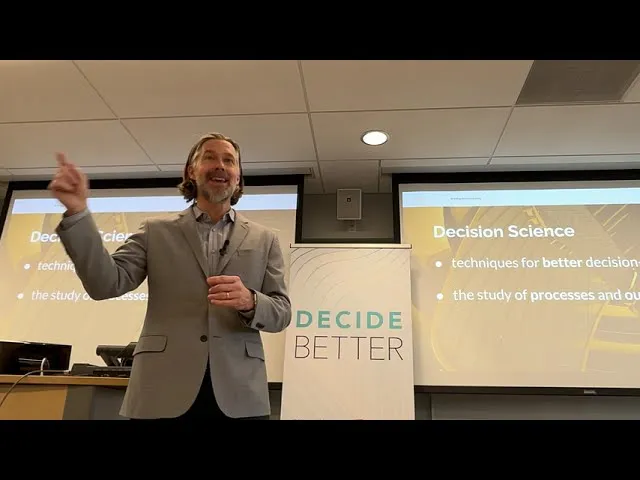 Matt Brady presenting the DECIDE BETTER session